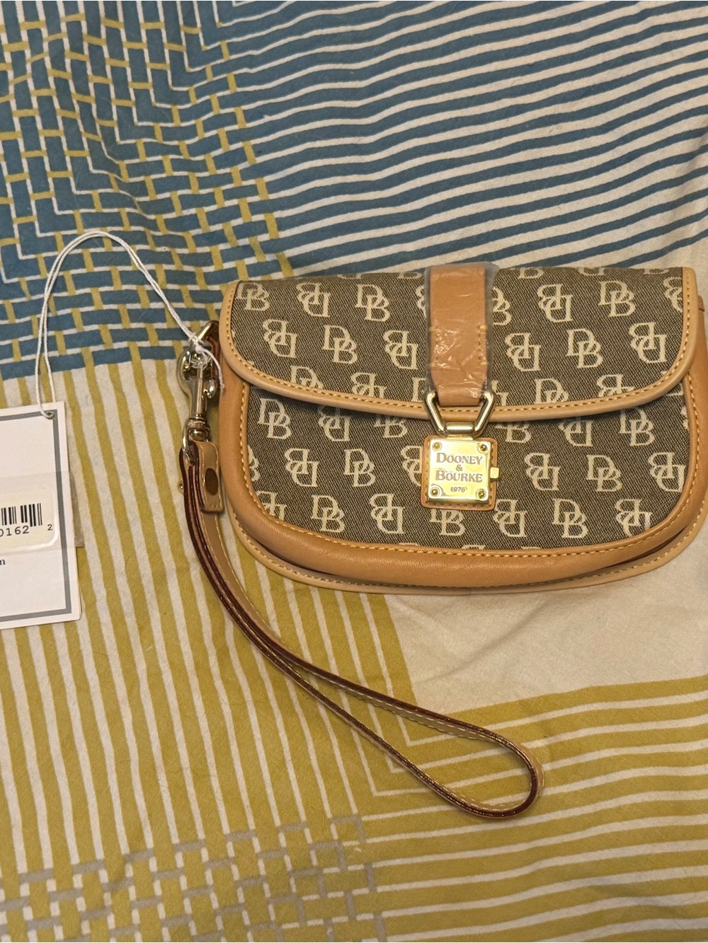 Vintage Dooney & Bourke Brown Logo Wristlet with Tan Trim and Gold Hardware